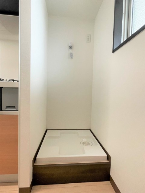 洗濯機置場はキッチンの横