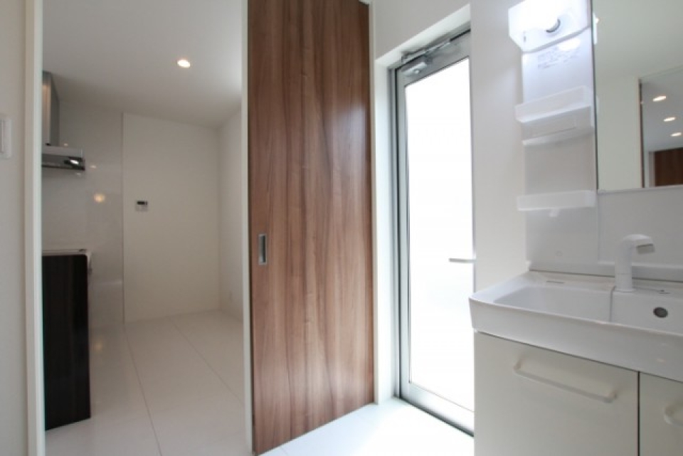 キッチンから続く洗面は家事導線◎