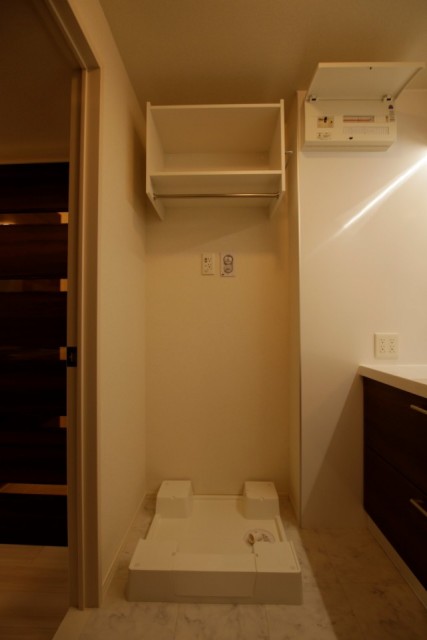 洗濯機の上の収納は気が利く