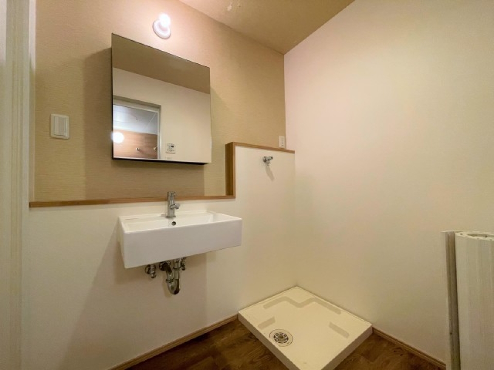 スッキリとした空間の洗面所。