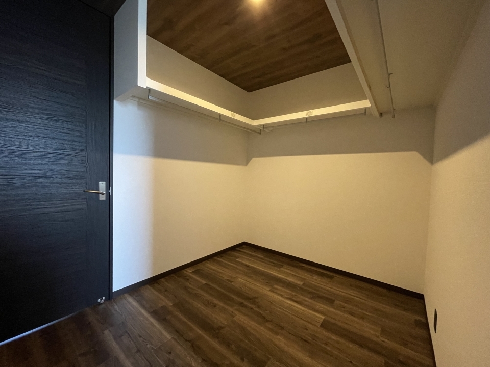 LDKと洋室を繋ぐ大きなWIC