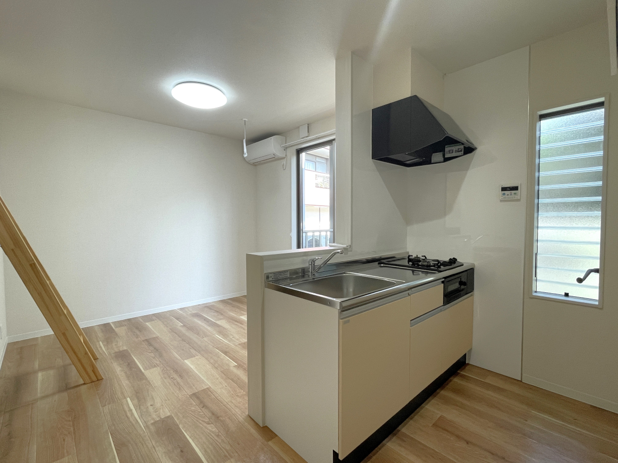 白の対面キッチン