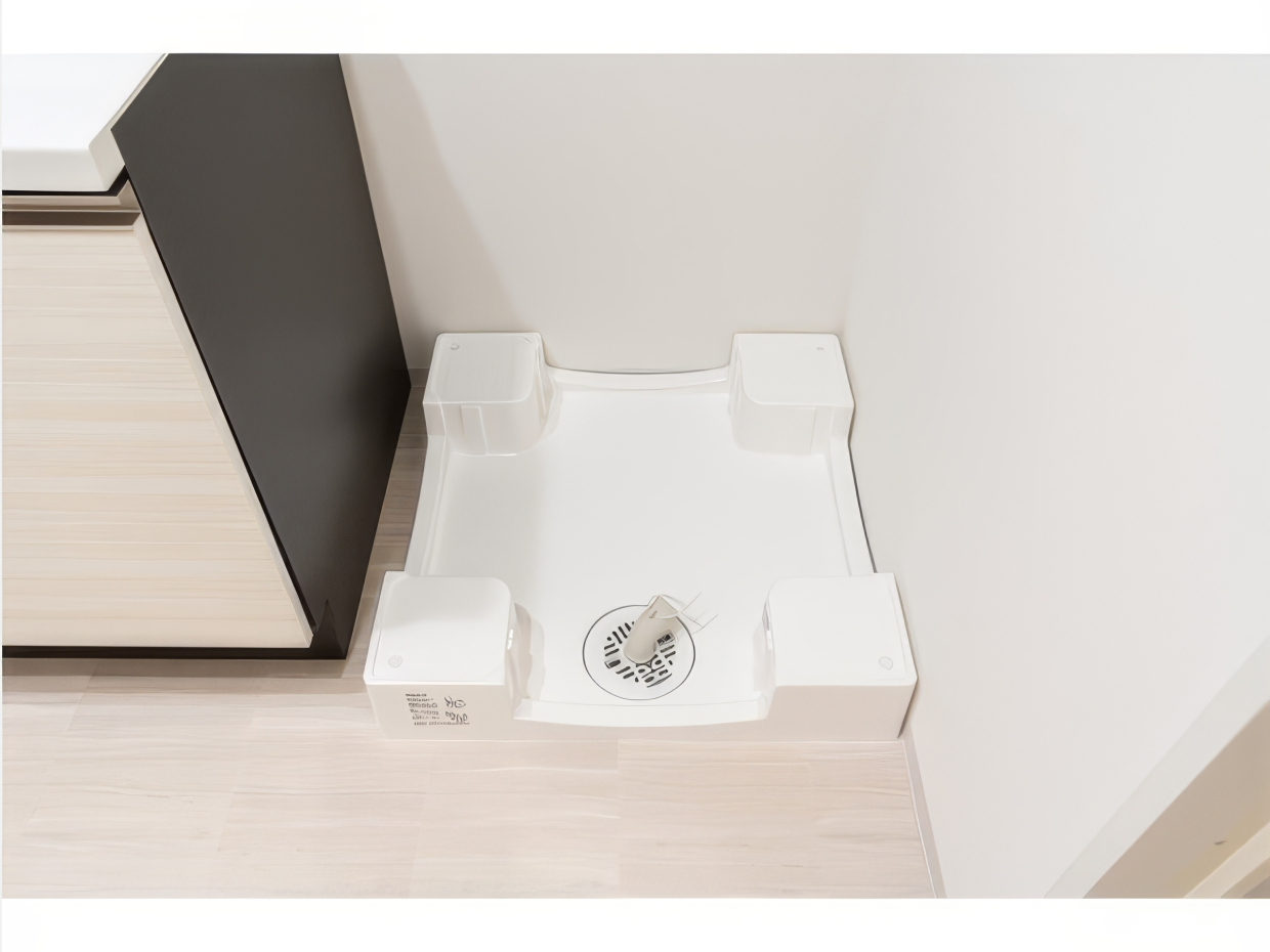 洗濯機は洗面台のお隣へ。