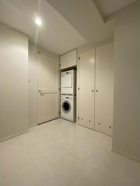 ランドリーコーナーはキッチンへ向かう途中にあります