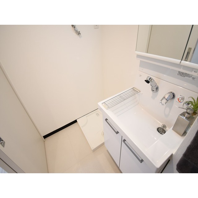 室内洗濯機置場。※写真はモデルルームのイ