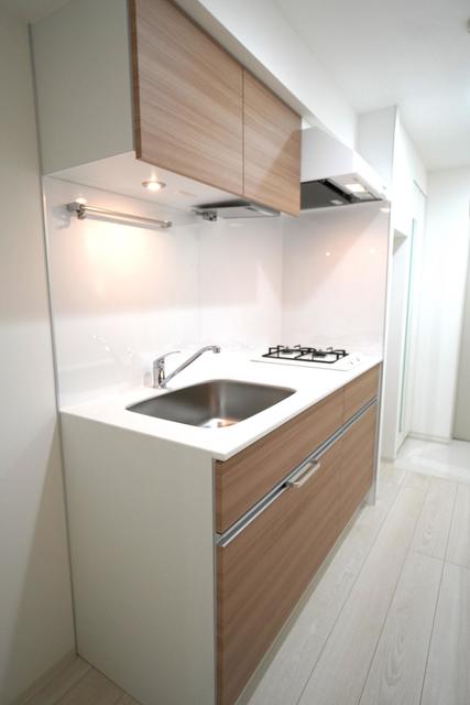 キッチンには木の温もりをプラス！
※写真は同タイプ住戸です。