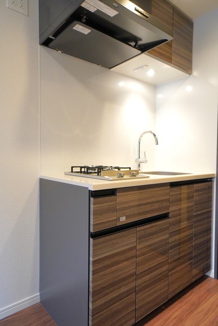 ブラウンのキッチン※写真は同タイプ住戸です。