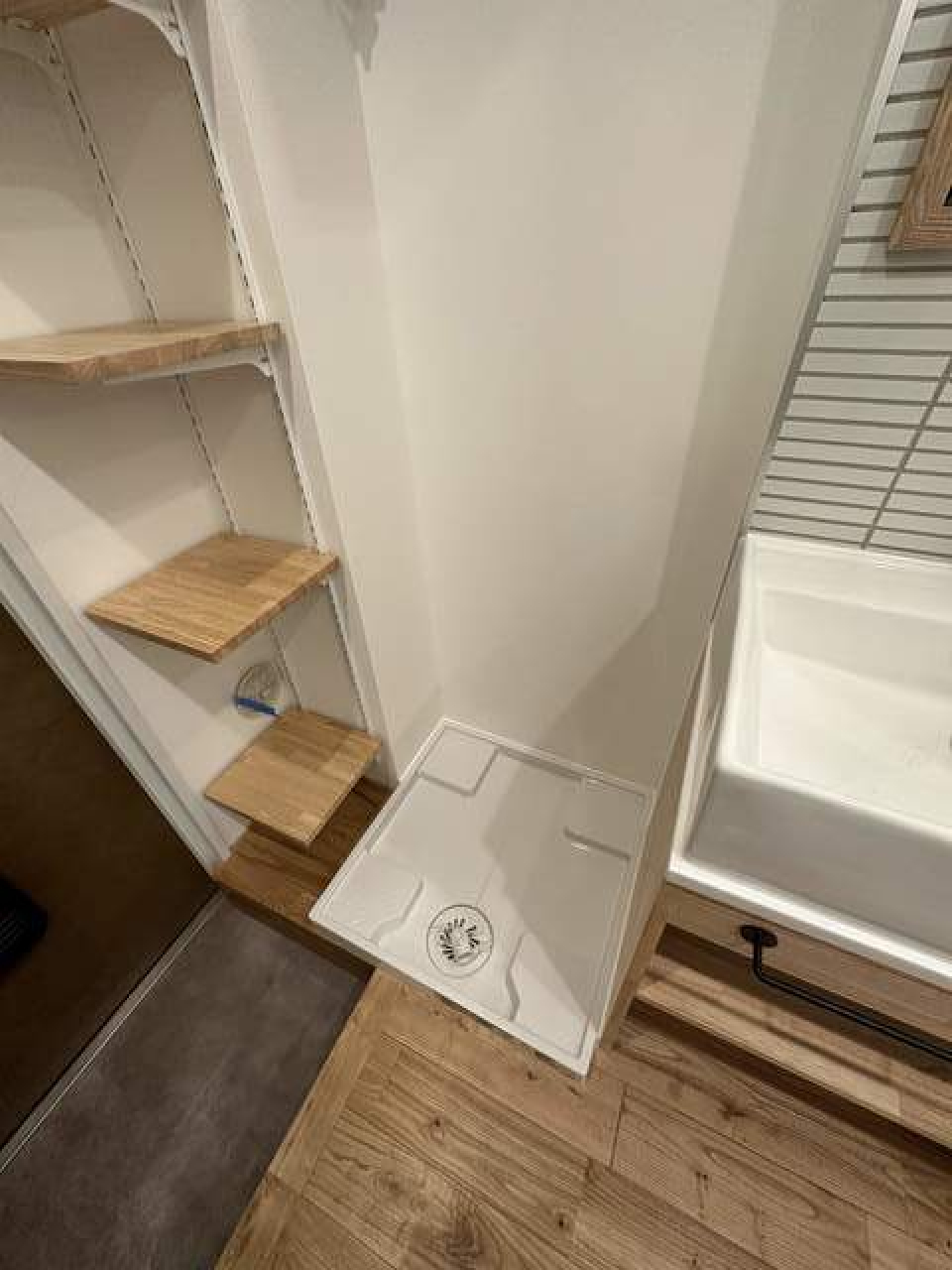 洗濯機はここに