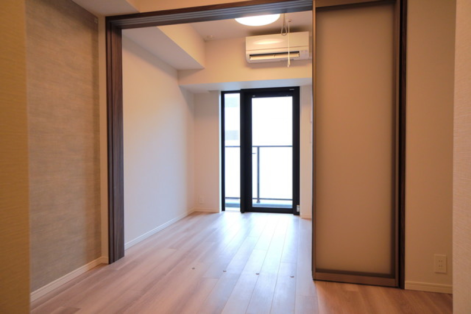 ５．４帖と３．２帖の空間は横引の扉で区切られています。※写真は同タイプ住戸です。