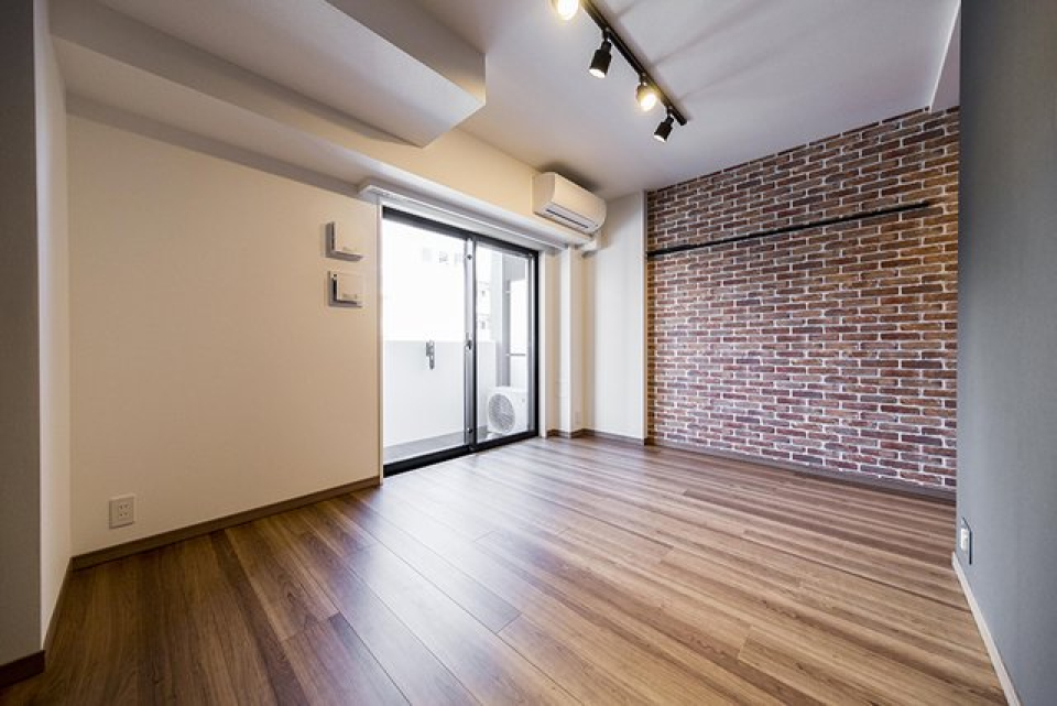 ブリック調の壁紙がかっこいい！※写真は同タイプ住戸です。