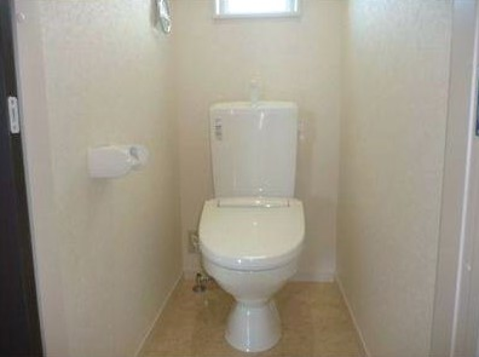 白を基調としたトイレ