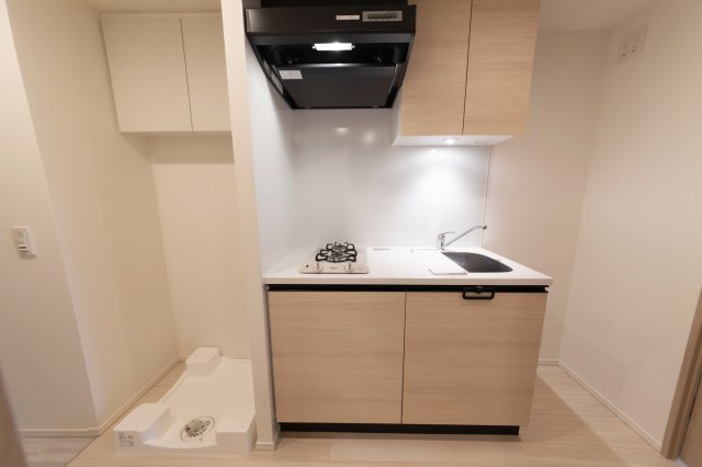 ナチュラルなパネルが導入されたキッチンです。