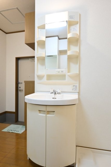 丸みのある洗面台。角張っていないから、ちょっとかわいい。