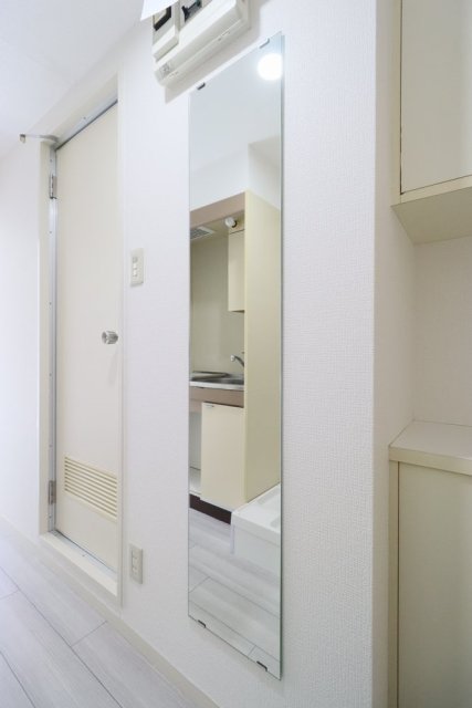 出発前に今日のコーディネートをチェック。