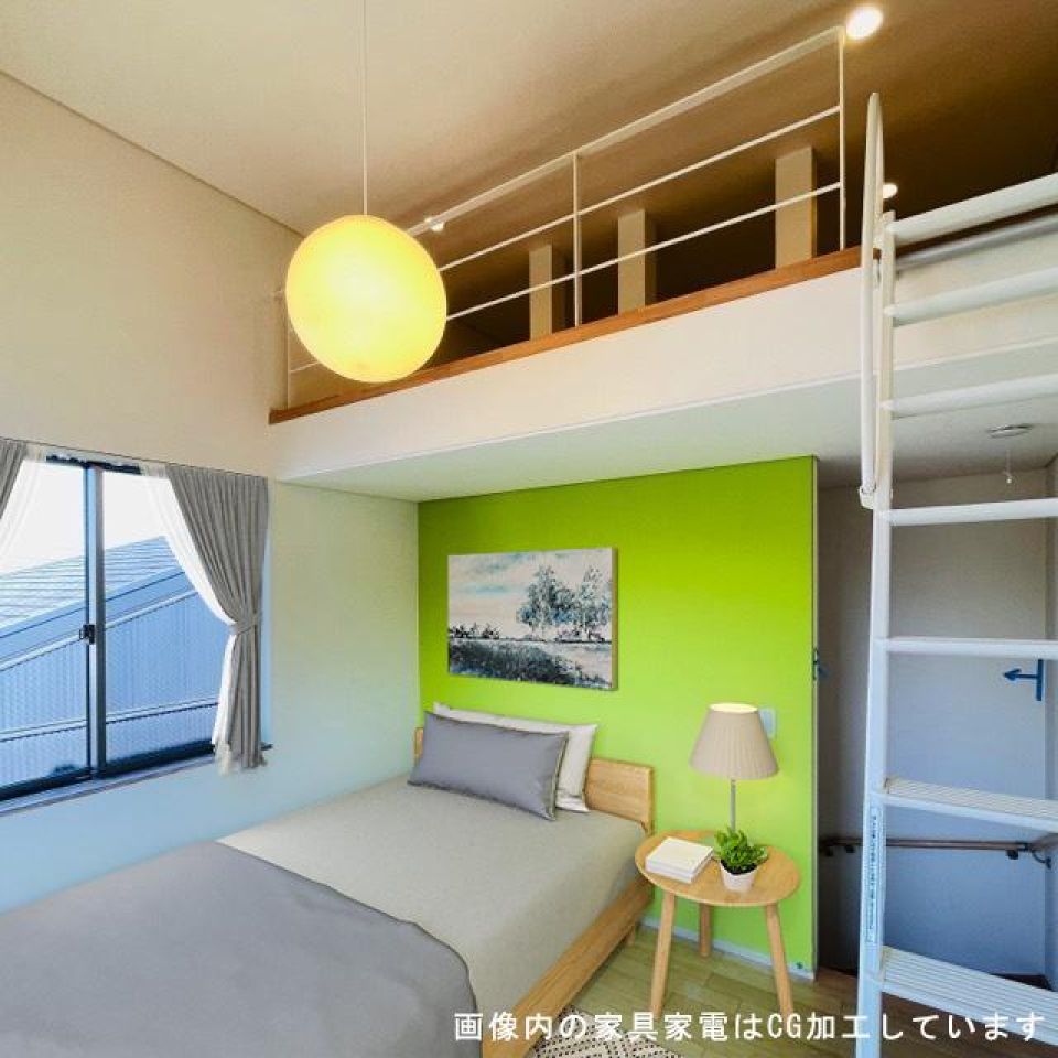 壁と照明が可愛くマッチしたロフト付きの洋室です