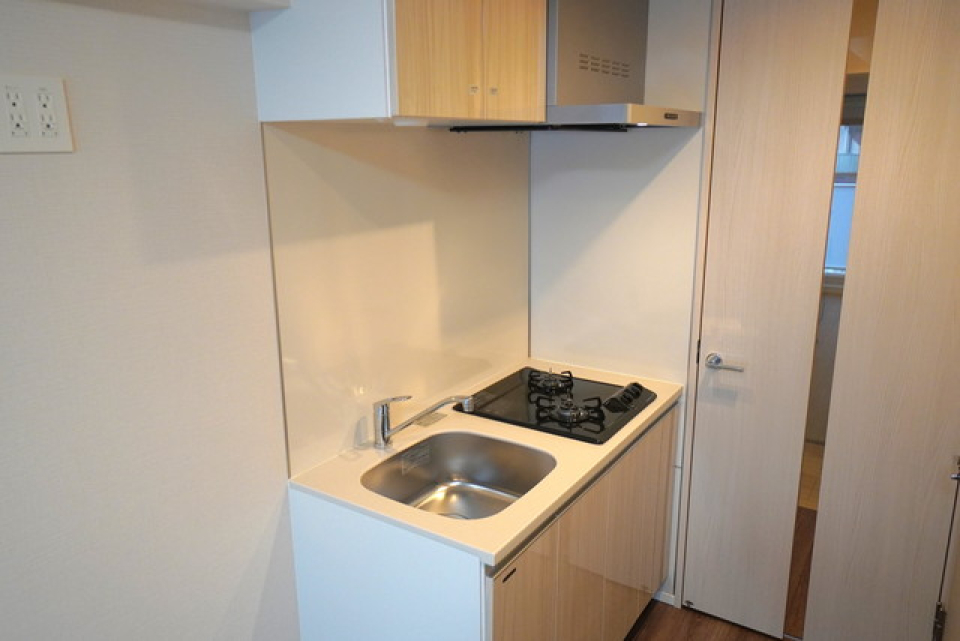 キッチンは上部にも収納できます。※写真は同タイプ住戸です。