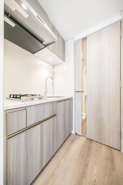 木目のキッチンがお洒落です。※写真は同タイプ住戸です。