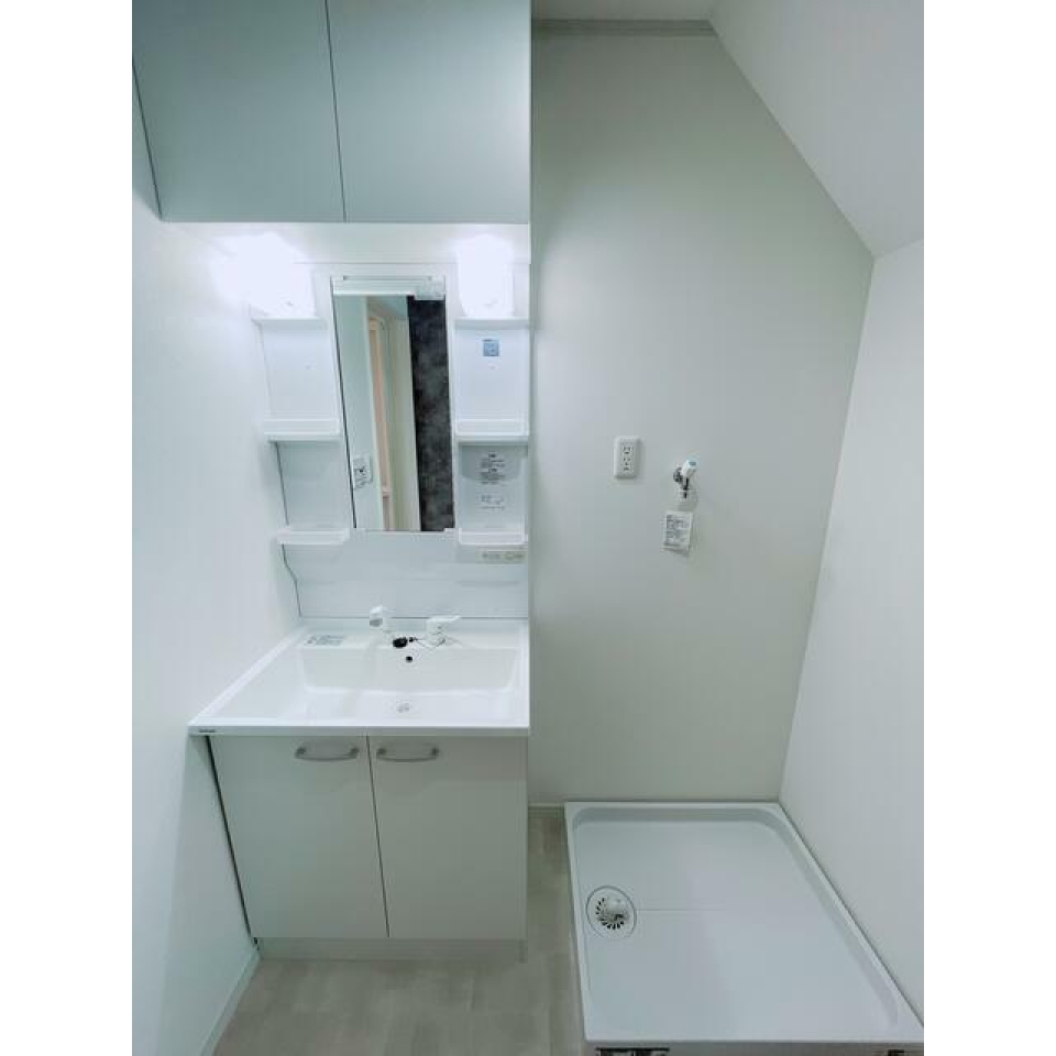 洗面・脱衣所
白基調で清潔感あふれる。