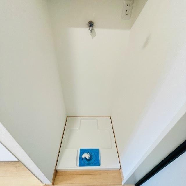 洗濯機置き場は玄関脇に配置