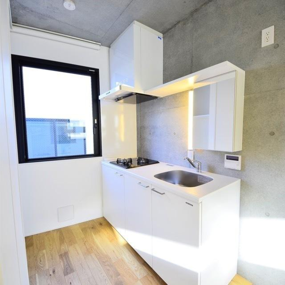 お洒落な照明がポイントのシステムキッチン