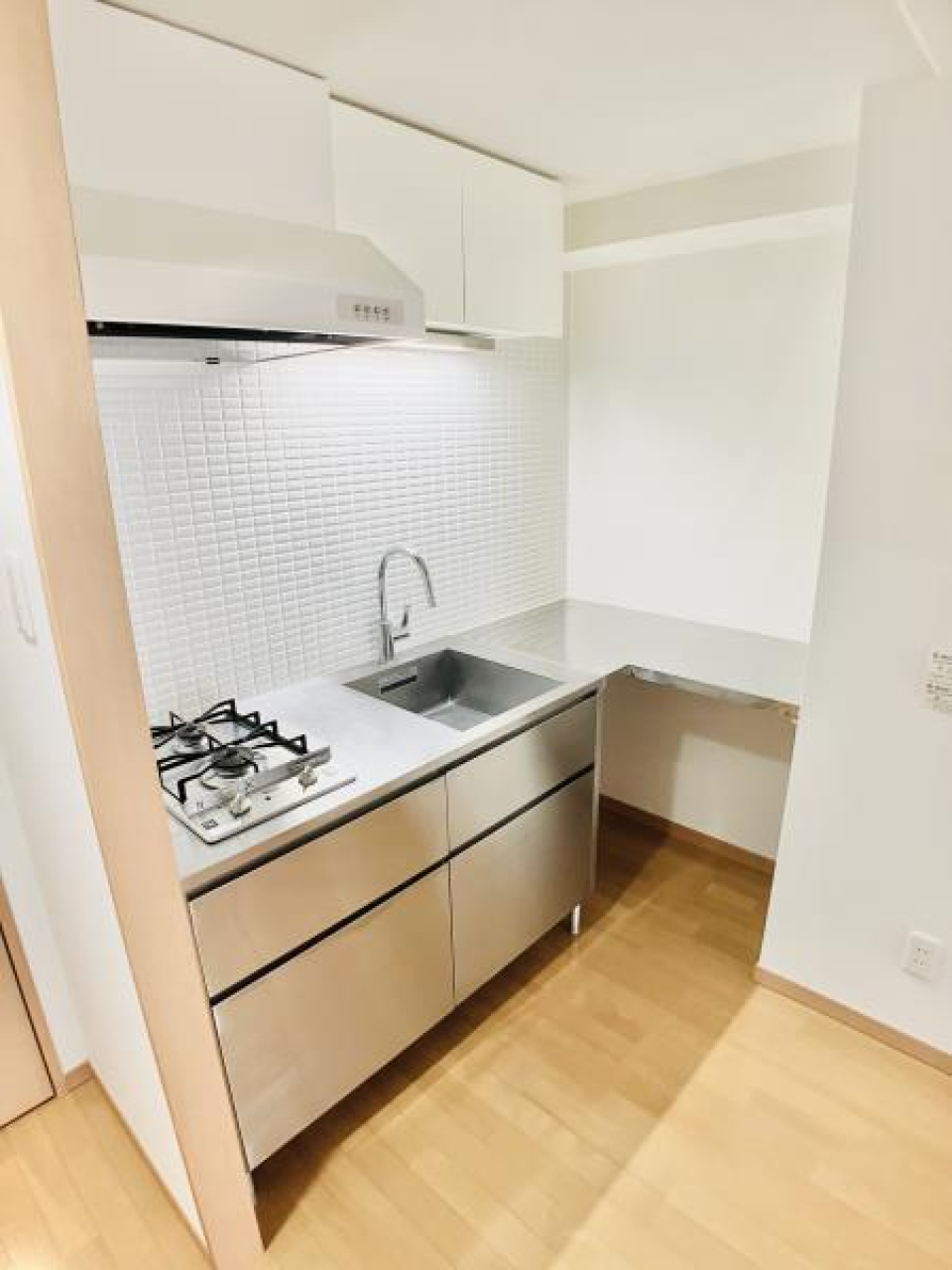 キッチンはなんとL字！お料理が捗りますね。