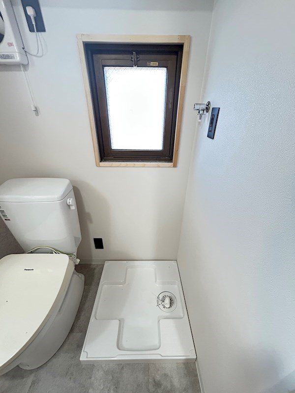 洗濯機はここに置いてね