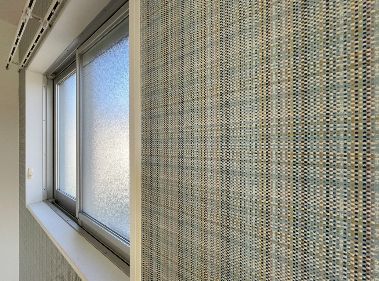 グリーンベースのチェック柄のアクセントクロス